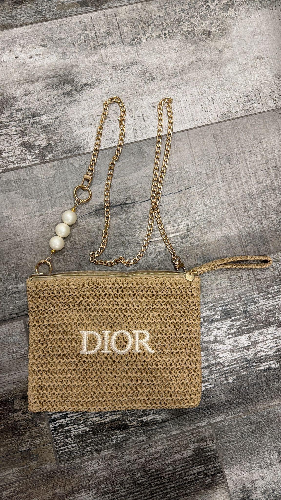 Pochette Dior in paglia con catena